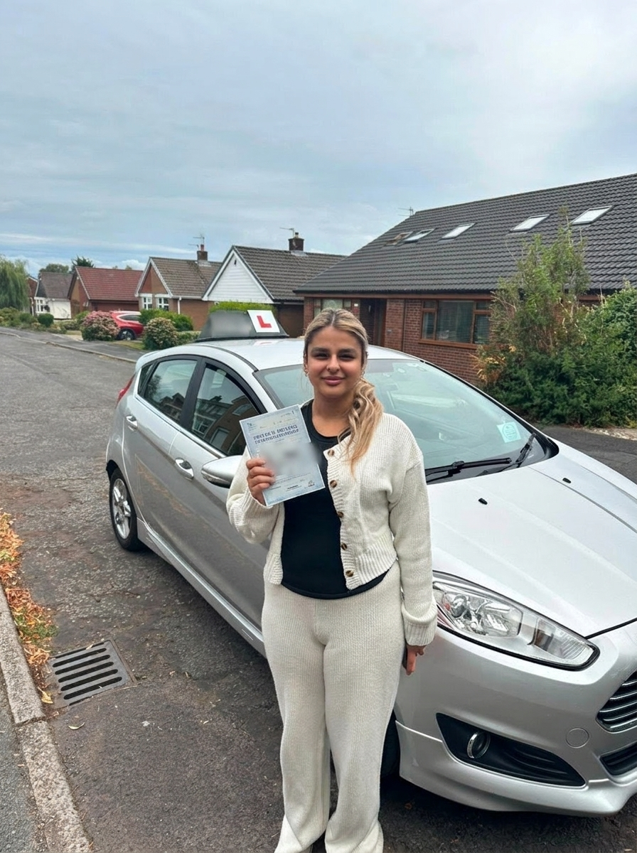 A learner celebrating with their pass certificate